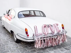 Häät|Häät>PartyDeco sp. z o.o. sp. k., ul. Kolumba 1, 70-035 Szczecin, www.partydeco.com Love hääautonkoristelusetti ruusukullanvärinen
