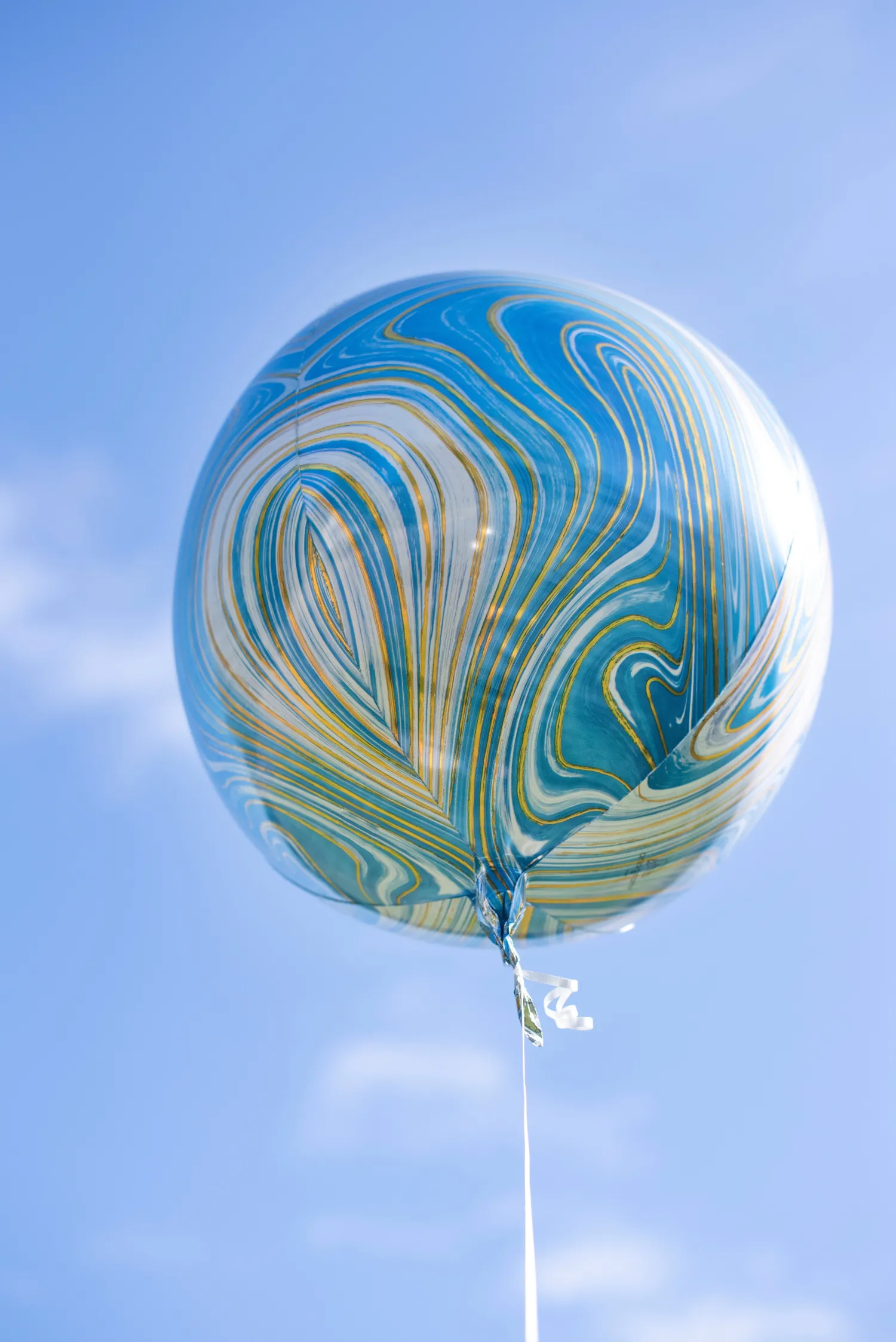 Erikoisfoliopallot>Anagram International Inc, 7700 Anagram Drive, MN 55344-7307, USA, http://www.anagramballoons.com/ Marmori pallokas sininen 3D muotofoliopallo